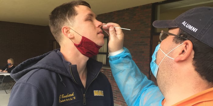 Myles Block tests cadet Jacob Bouchard for COVID-19 using Puritan swab 25-1506 1PF 100. 